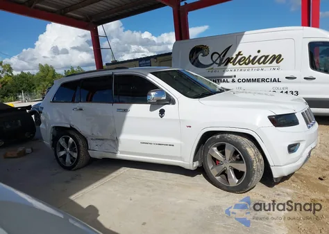 2014 Jeep Grand Cherokee Overland z USA, uszkodzony, nr VIN 1C4RJECT2EC329957